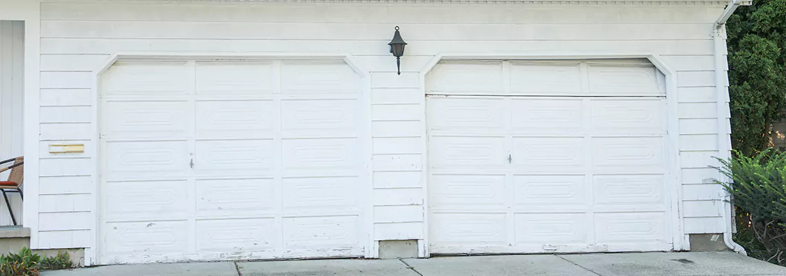 Roller Garage Door Dropped Down Replacement in Palm Beach Gardens, FL