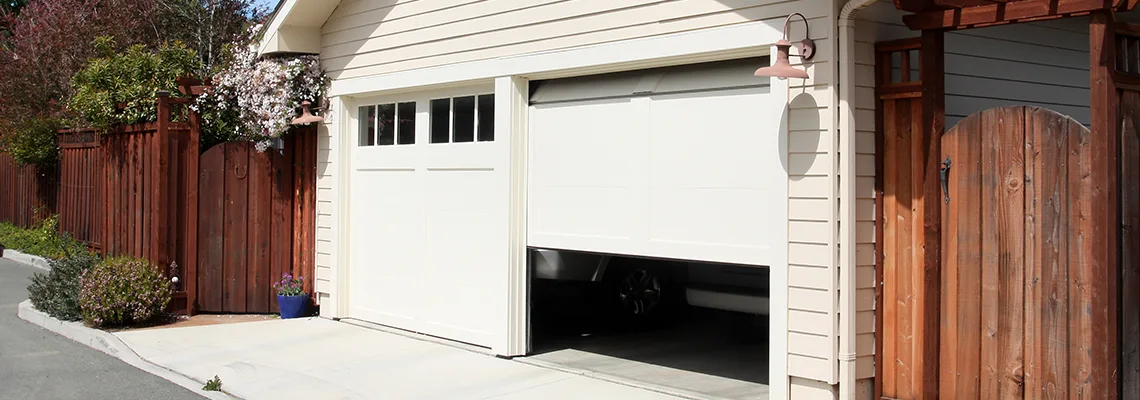 Fix Metal Garage Door Jerking in Palm Beach Gardens, Florida